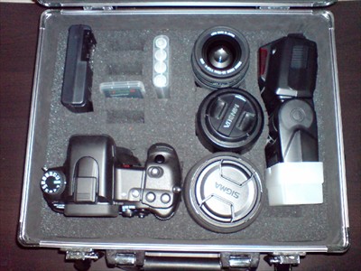 Case with Sony a700, flash and three lenses.