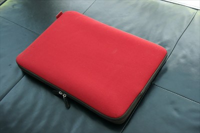 red and brown laptop case sleeve with zipper